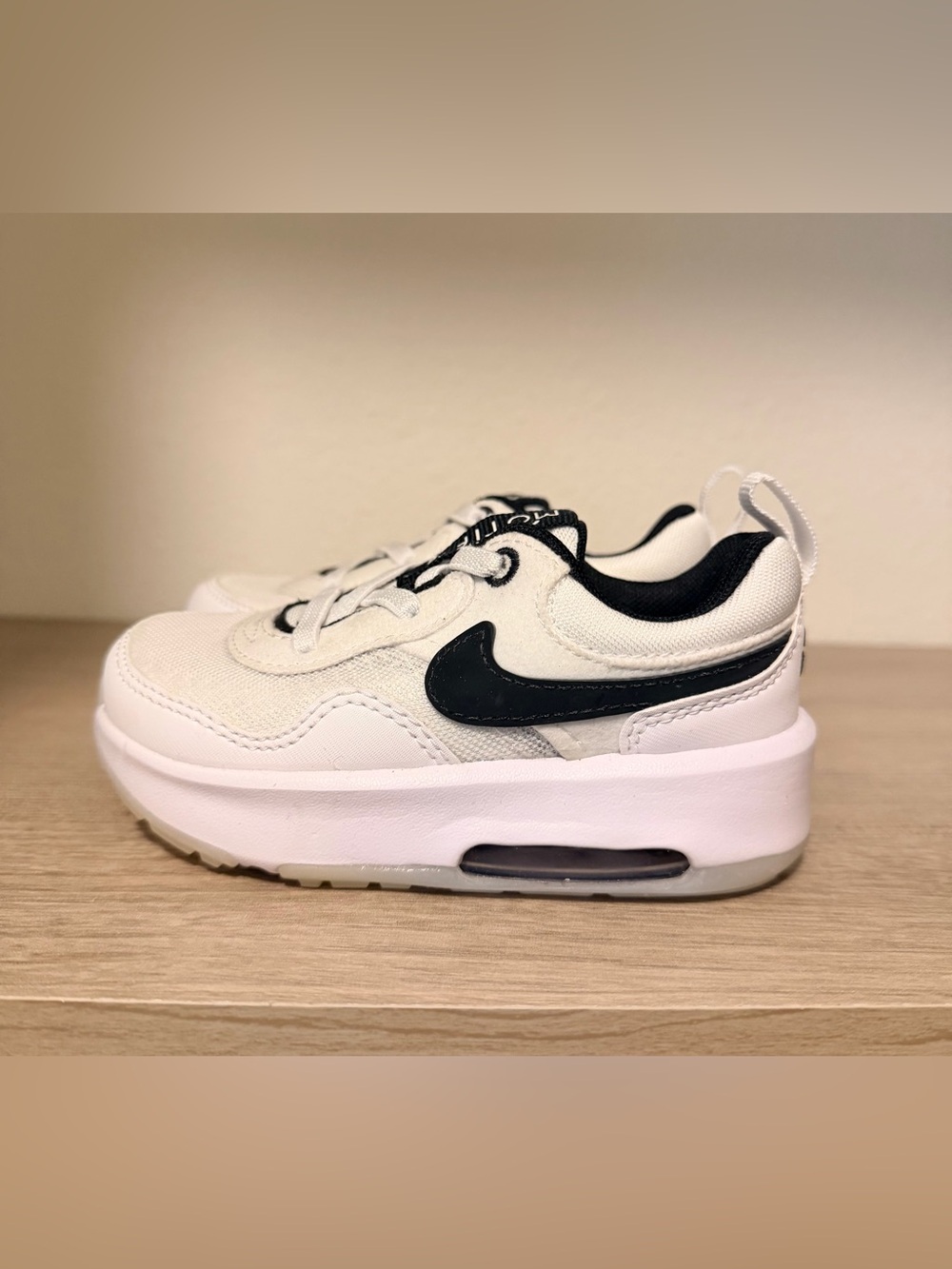 Nike Kids White Sneakers with Black Swoosh